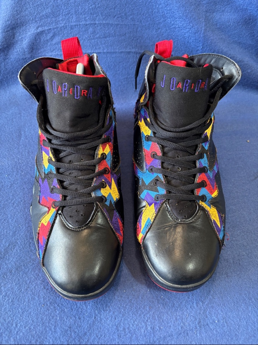 Jordan Black Sneaker with Red Lining and Multicolor Accents